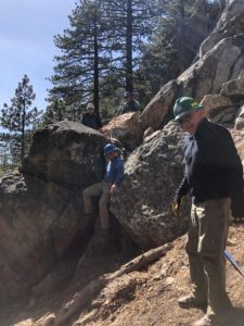 Volunteers scout new areas to convert into trail for the Tahoe Rim Trail System near Castle Rock to protect Peregrine Falcon nesting sites.