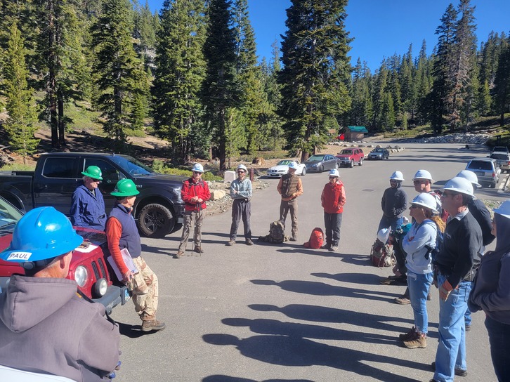 Crew leaders instruct volunteers before working on a trail reroute project along the Tahoe Rim Trail near Castle Rock.